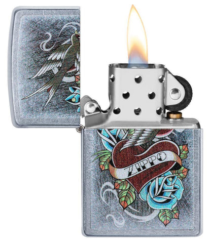 Vintage Tattoo Zippo Windproof Lighter open and lit