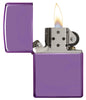 Classic High Polish Purple Windproof Lighter with its lid open and lit