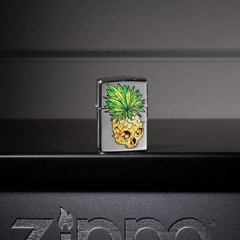Lifestyle image of Leaf Skull Pineapple Design Windproof Lighter standing on a metal Zippo shelf