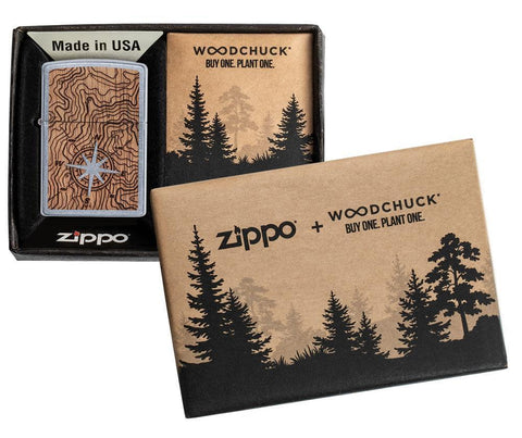 Front view of the WOODCHUCK USA Compass Lighter in packaging