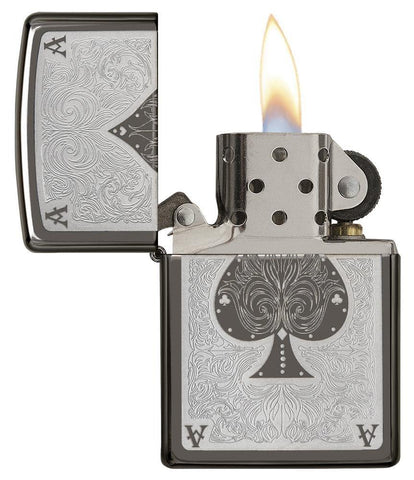 Ace Filigree Engraved Windproof Lighter with its lid open and lit.