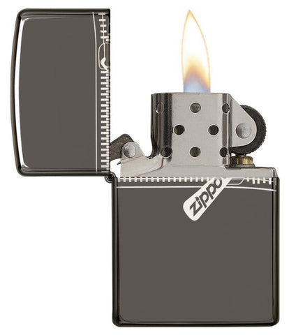 Zippo Zipper Design Windproof Lighter with its lid open and lit.
