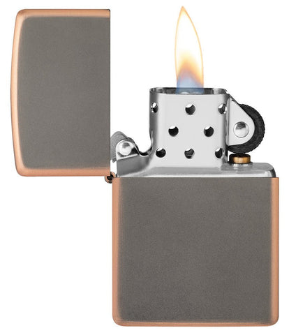Classic Rustic Bronze Windproof Lighter with its lid open and lit.