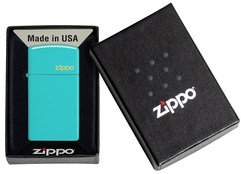Zippo Slim Flat Turquoise Zippo Logo Pocket Lighter in its packaging.