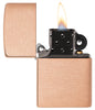 Classic Solid Copper Windproof Lighter with its lid open and lit.