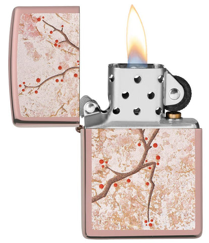 Eastern Design Cherry Blossom High Polish Rose Gold Windproof Lighter with its lid open and lit.