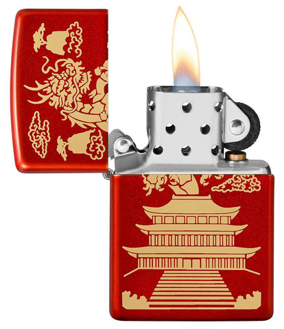 Eastern Design Dragon Design Metallic Red Windproof Lighter with its lid open and lit.