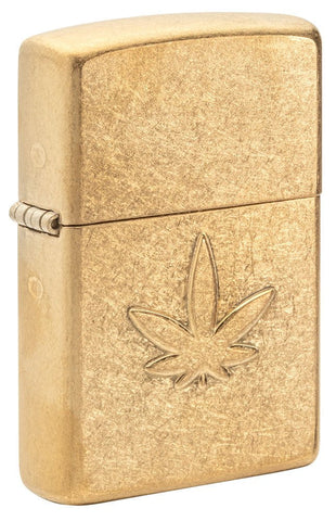 Front shot of Cannabis Design Stamped Leaf Tumbled Brass Windproof Lighter standing at a 3/4 angle.
